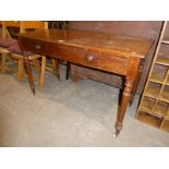 A late Victorian mahogany side table with moulded edge rectangular top above a pair of frize