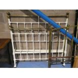 A Victorian metal and brass double bedstead with rails