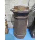 An octagonal section chimney pot