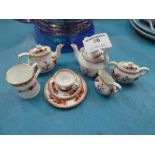 A Coalport Indian Tree children's set of tea ware, 8 pieces.