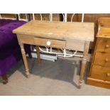 A Victorian single drawer side table.