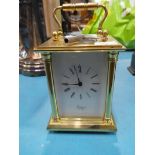 A Rapport 13 jewel movement carriage clock, with white enamel Roman dial, striking on bell, 12 cm H