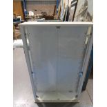 A white two door glazed display cabinet for model vehicles etc with 10 glass shelves.