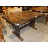 A small elm refectory table with waney rectangular top.