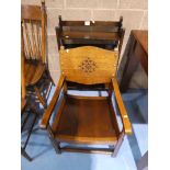 A mid century oak nursing chair and an oak 3 tier small free standing book rack.
