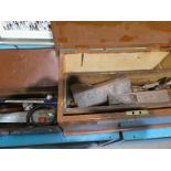 A pine box of joiner's tools and a steel ammo box of tools.