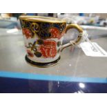 A Royal Crown Derby miniature tankard, 4 cm H