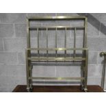 A brass single bedstead with rails.