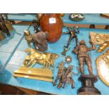 Twelve items of brass and metalware including Horse doorstops, brass horse, bear money bank,