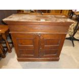 A small walnut two door low cabinet