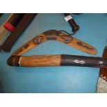 An Aboriginal souvenir boomerang and a digeridoo