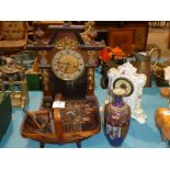 A wooden mantle clock, a cuckoo clock, a porcelain cased clock, small wooden trug and damaged