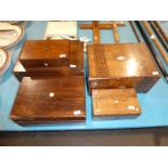 Five wooden trinket boxes including rosewood and mahogany
