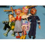 Four pelham puppets circa 1950's/60's; Dutch Girl, Mitzi, Baby Dragon and Policeman
