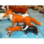 A Beswick large and small standing fox and collie dog