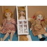 A 1980s bisque doll kit complete with plan, plus two similar period rag dolls.