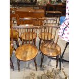 Set of four 19th century fruitwood spindle back dining chairs