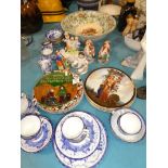 A selection of blue and white teaware, mixed plates and Staffordshire figures etc
