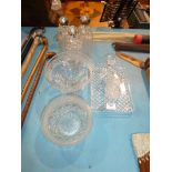 Eight items of cut and moulded glass including decanters and fruit bowls etc