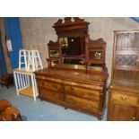 An Edwardian walnut mirror back sideboard