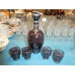 A mid 20th century five piece silver overlay purple glass vodka set including a decanter and four