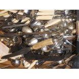 A box of mixed cutlery