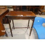 A 1930s mahogany fold over top card table with baize playing surface