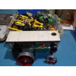 A box of lego and a Mamod model road engine