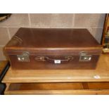 A good quality brown leather vintage suitcase