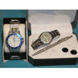 A Slazenger wrist watch and Philip Mercer watch, pen and cufflink set