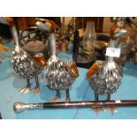 Inlaid walking stick and three modern metal ornamental ducks