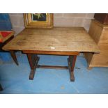 An oak refectory style kitchen table