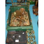 A cash tin, brass fireplace accessories and mixed copper and brassware