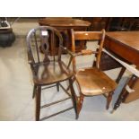 A childs tall chair and a bar back kitchen chair