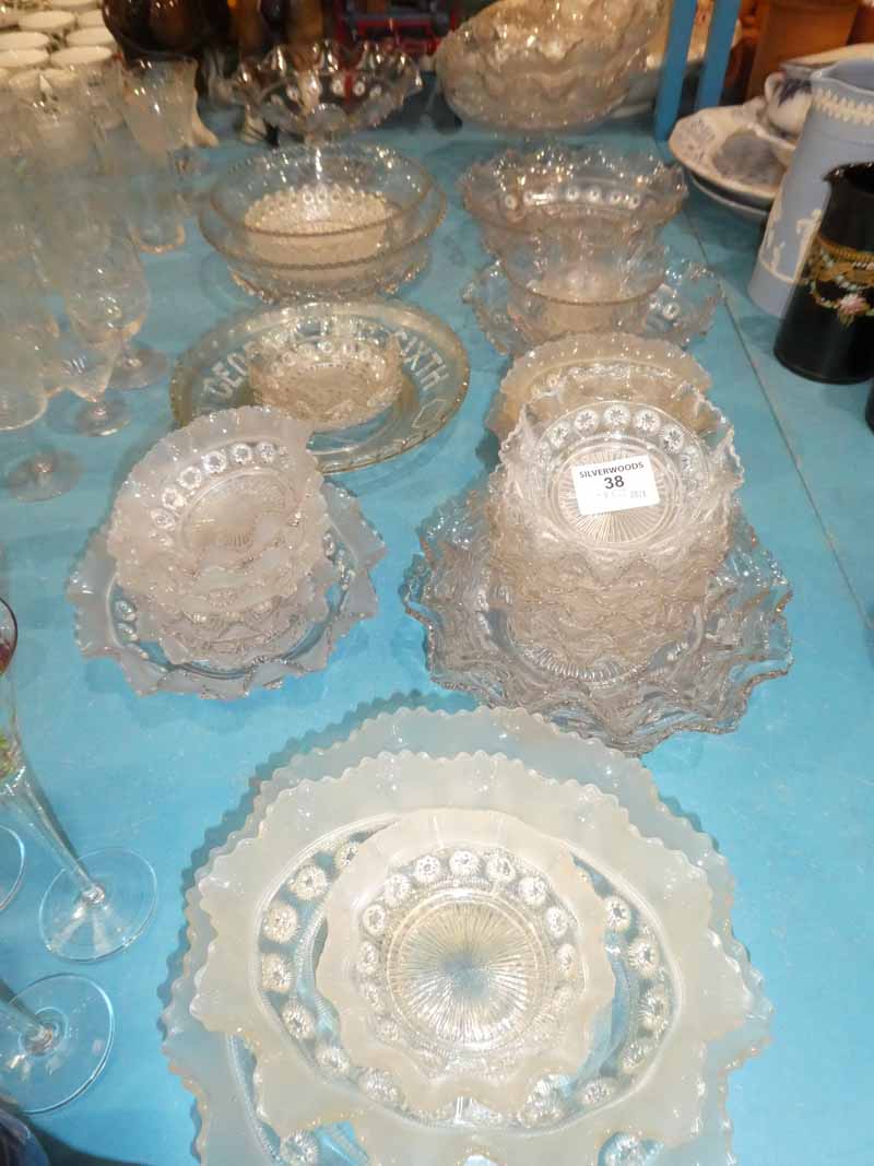 A selection of early 20th century moulded table glass including bowls, dishes comports etc