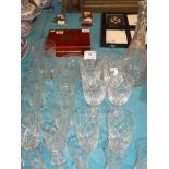 15 etched Grapevine glasses, eight crystal glasses plus crystal decanter