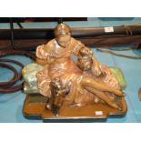 A plaster figure of a seated lady with two dogs and a pair of watercolour maritime scenes