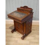 A Victorian aesthetics walnut Davenport desk with fitted interior 92cm H