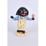Carlton ware large golly figure styled as Florence Upton. Black backstamp marked Colour Trial 21cm