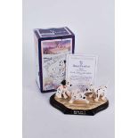 A Royal Doulton tableau of Disney's 101 Dalmations, Patch, Rolly and Freades Ltd edition 1695/