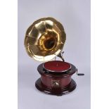 HMV Gramophone in cylindrical mahogany cabinet and brass trumpet. 62cm high