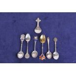 A Celtic silver caddy spoon marked Glasgow 1954, plus five silver souvenir spoons and a teaspoon