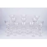 Set of nine Coupe shaped wine glasses on encapsulated bubble baluster stems, approx 15cm high,