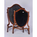 Victorian mahogany shield shaped toilet mirrors together with an Edwardian example with boxwood