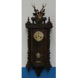 Vienna style wall clock with drum movement and later applied stags head