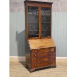 A Victorian mahogany elevated bureau bookcase