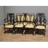 An Edwardian mahogany seven piece parlour suite, comprising of two seat sofa, a pair of carver