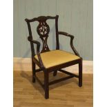 An 18th century mahogany carver chair with carved pierced backsplat and carved crest rail, square