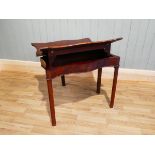 A George III Cuban mahogany butterfly leaf fold over tea table, 84 cm W