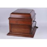 Columbia box gramophone in oak case with integral sound box behind louvers at the front. 44cm x 48.